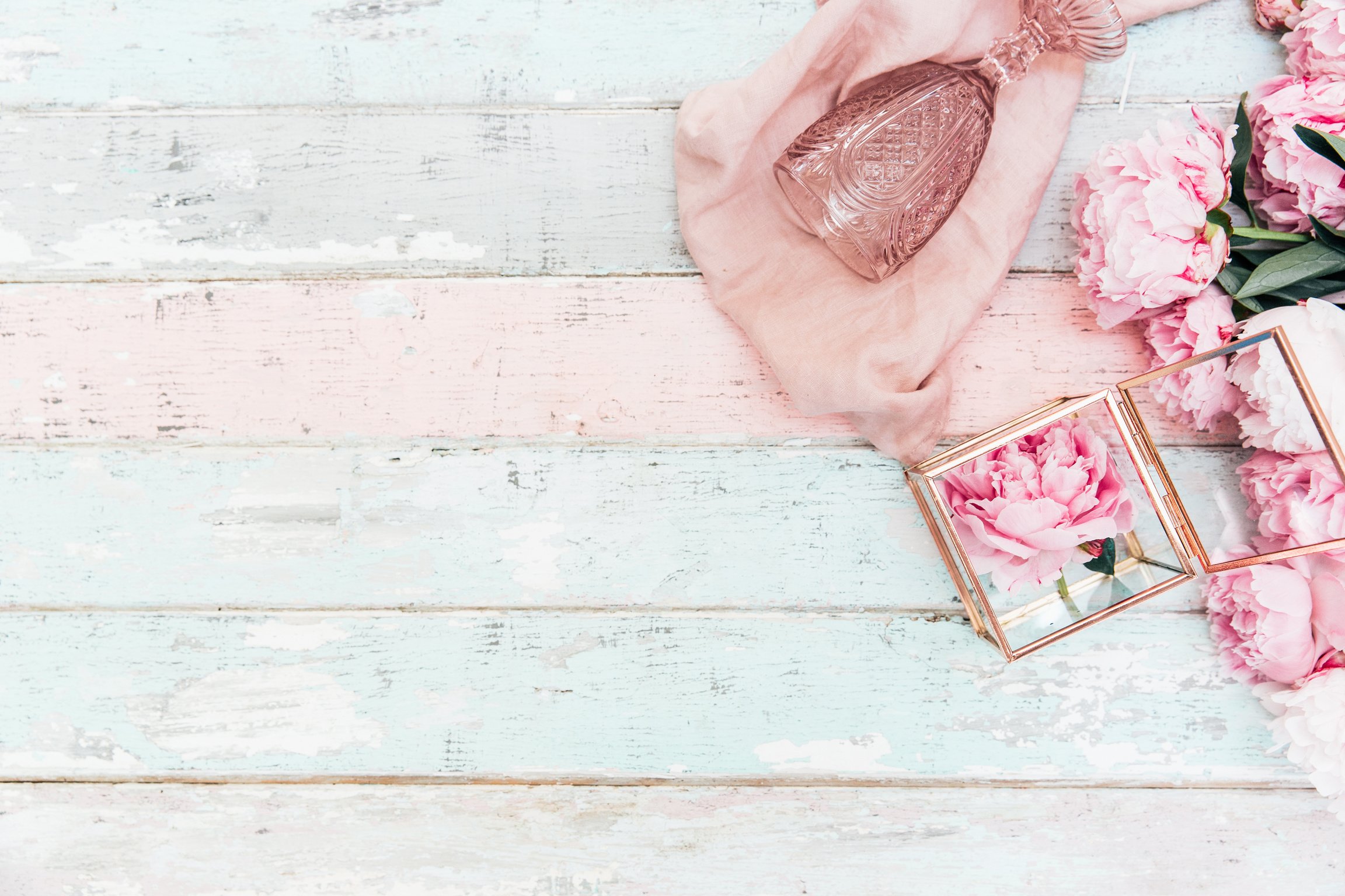 Flat lay Pink peony bouquet on shabby chic background .